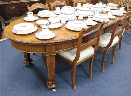 A 1920s mahogany extending dining table, extends 240cm W.99cm